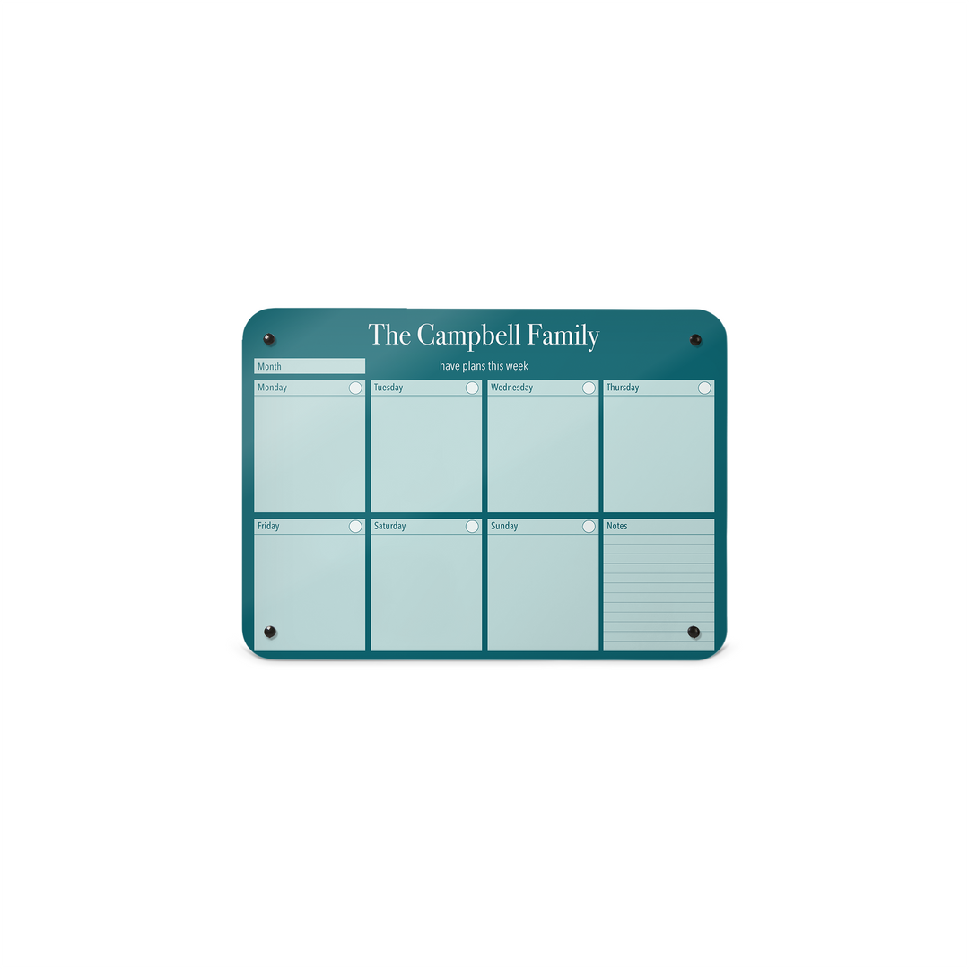 A small magnetic notice board by Beyond the Fridge with a weekly planner design to personalise  in a teal colour and landscape format 