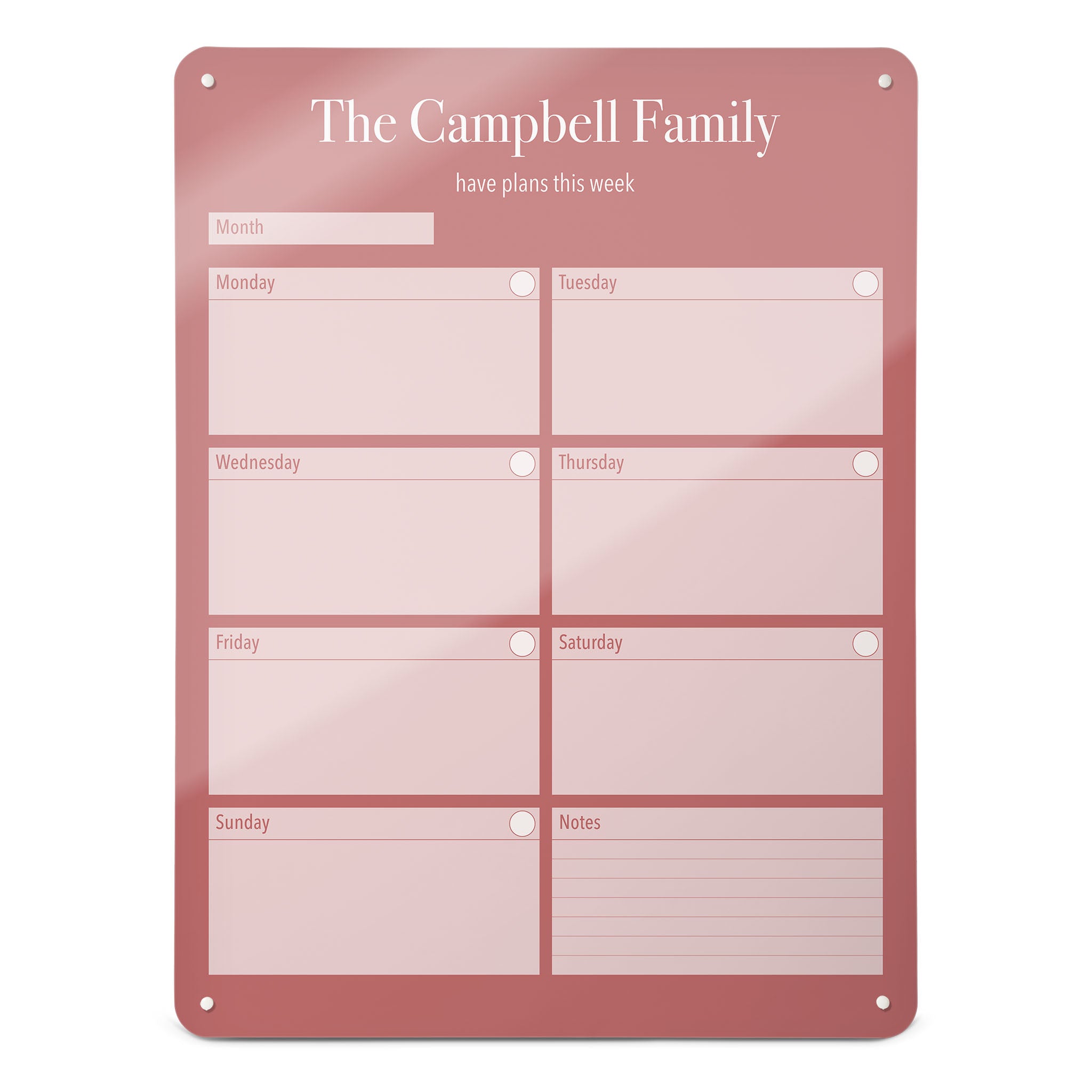 A large magnetic notice board by Beyond the Fridge with a weekly planner design to personalise  in a pink colour and portrait format