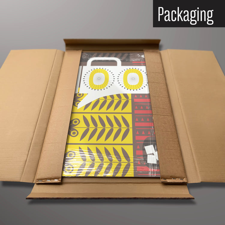 A retro coffee pot design magnetic board in it’s cardboard packaging