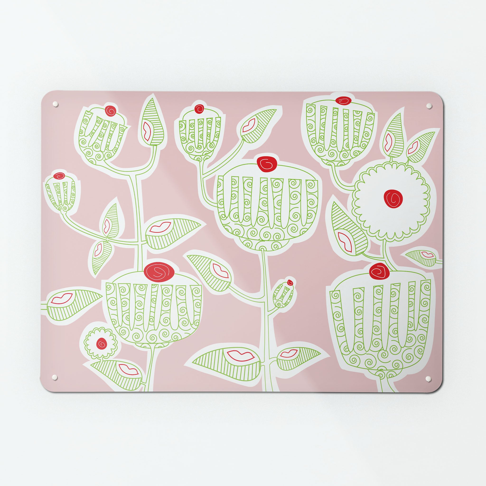 A large magnetic notice board by Beyond the Fridge with a cupcake plant design in green, red, white and pink