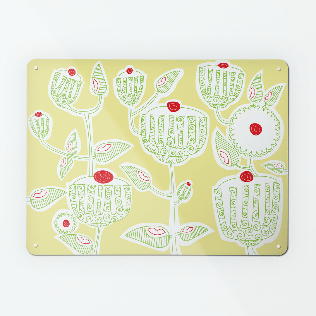A large magnetic notice board by Beyond the Fridge with a cupcake plant design in green, red, white and yellow