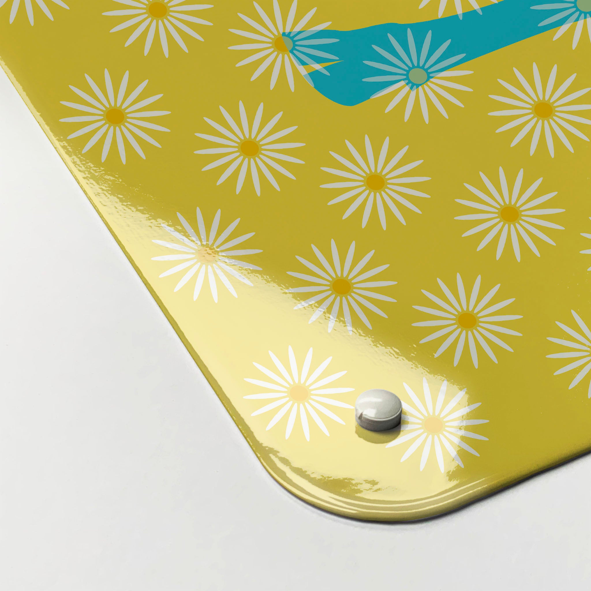 The corner detail of a daisy the cow blue design magnetic board to show it’s high gloss surface