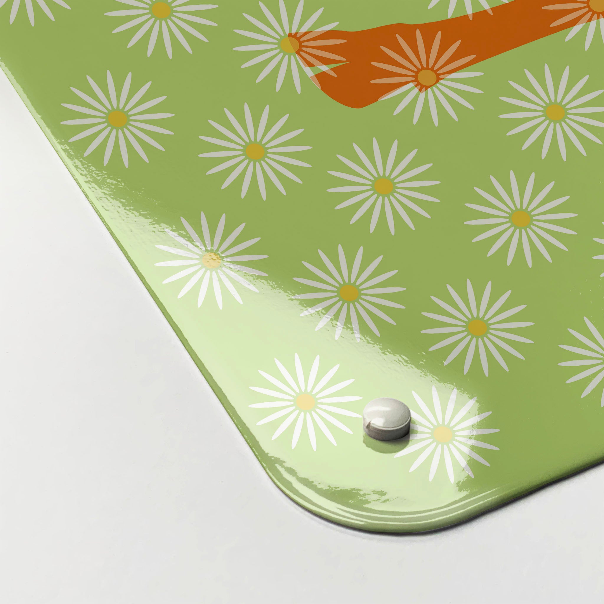 The corner detail of a daisy the cow orange design magnetic board to show it’s high gloss surface