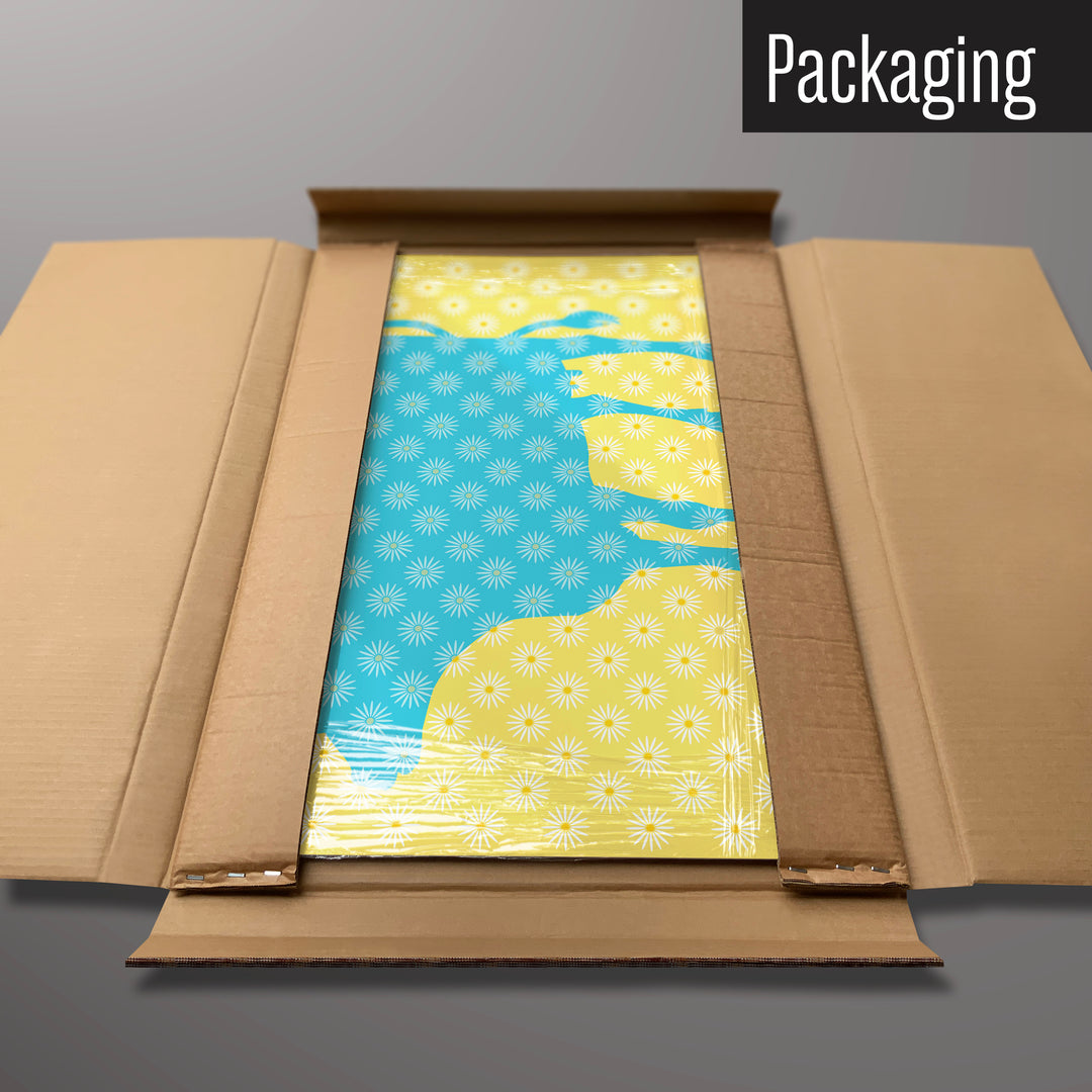 A daisy the cow blue design  magnetic board in it’s cardboard packaging