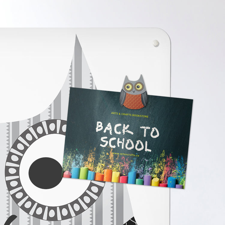 A postcard on a fair isle owl design magnetic board or metal wall art panel