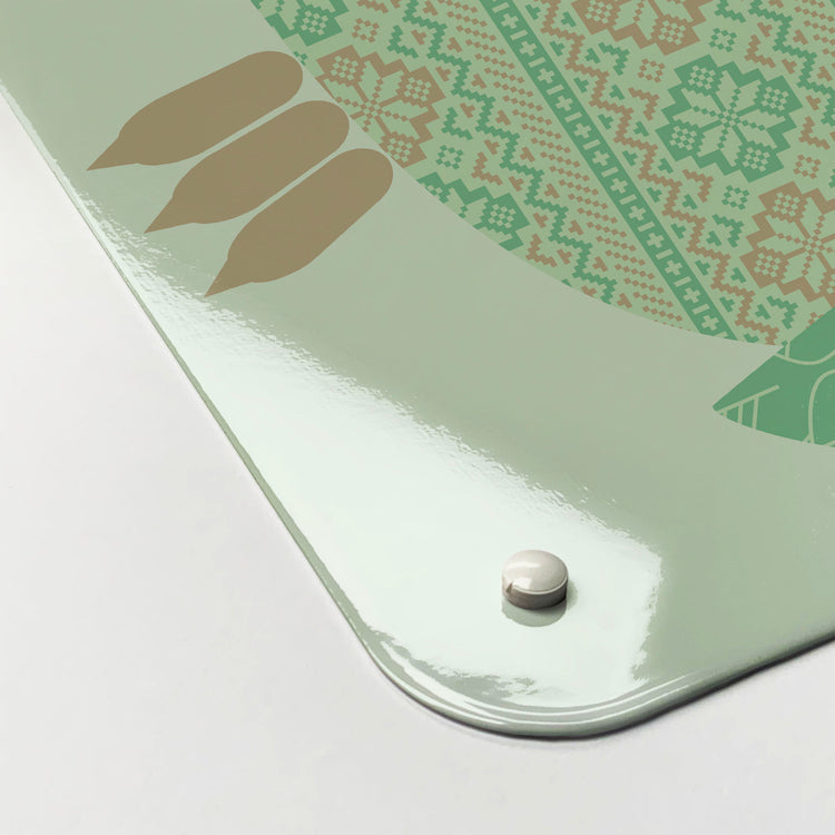 The corner detail of a Fair Isle Owl turquoise magnetic board to show it’s high gloss surface