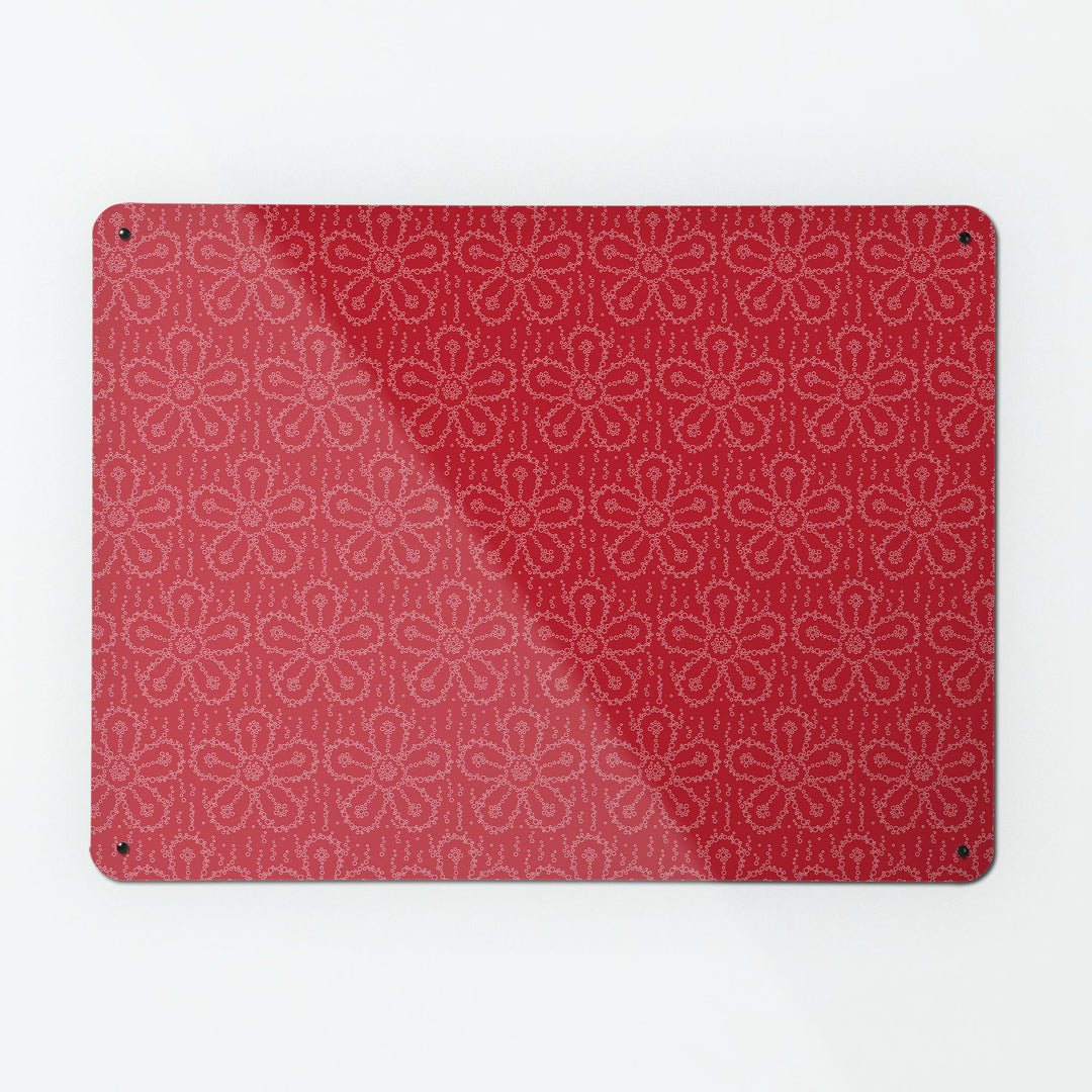 A large magnetic notice board by Beyond the Fridge with a fizzy flower pattern in cherryade colour