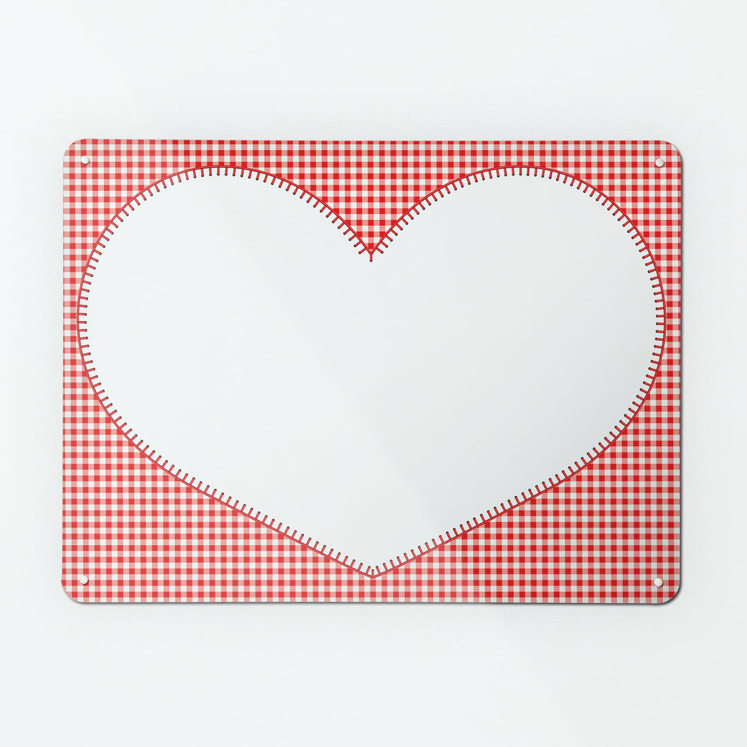 A large dry wipe magnetic notice board by Beyond the Fridge with an image of a white heart on a red gingham background