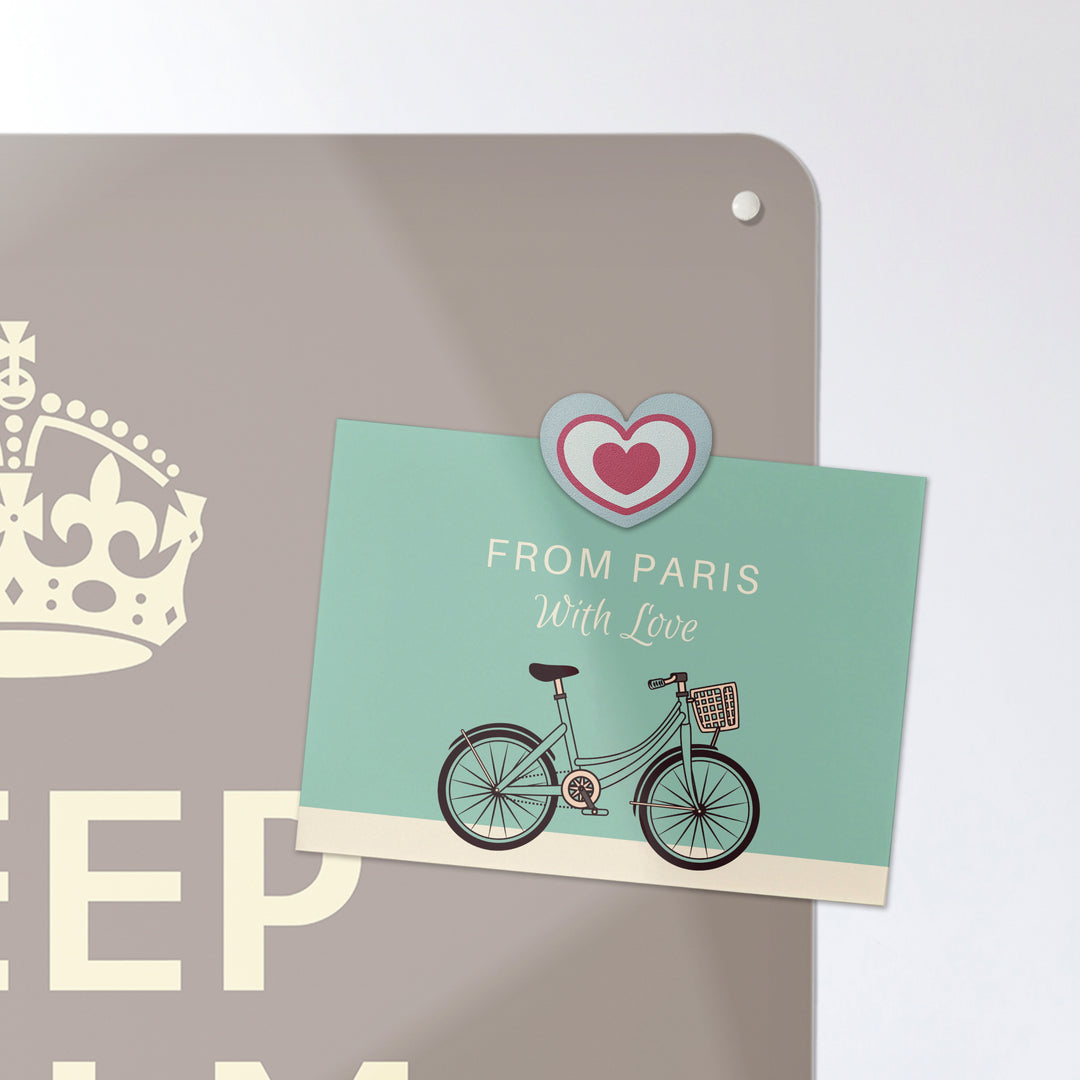 A postcard on an brown keep calm and carry on magnetic board or metal wall art panel