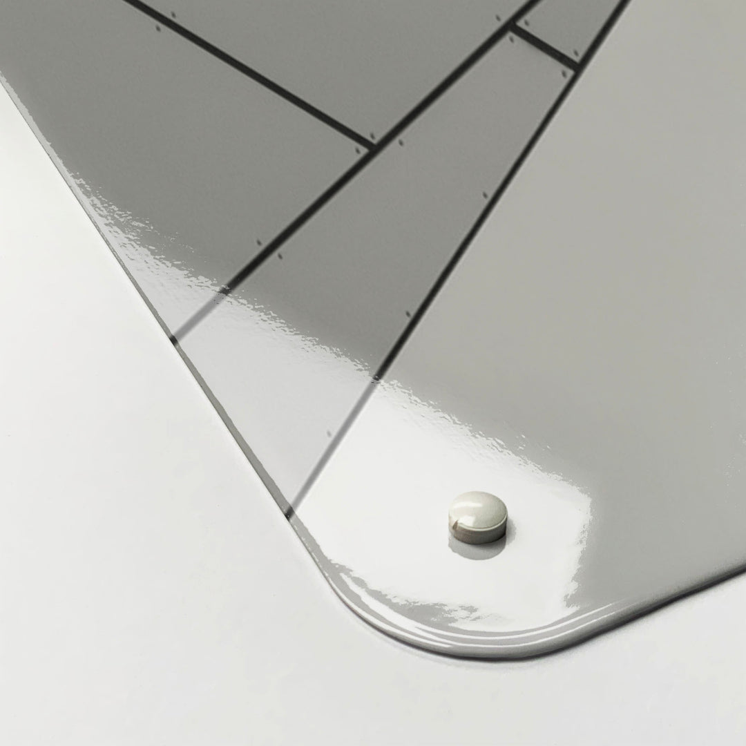 An abstract windows black and white Magnetic board in it’s cardboard packaging