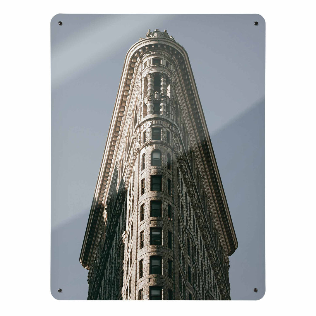 A large magnetic notice board by Beyond the Fridge with an image of the flatiron building in Manhattan