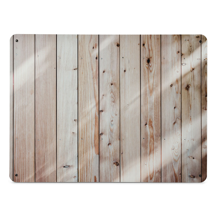 A large magnetic notice board by Beyond the Fridge with a photograph of planks of light coloured wood cladding