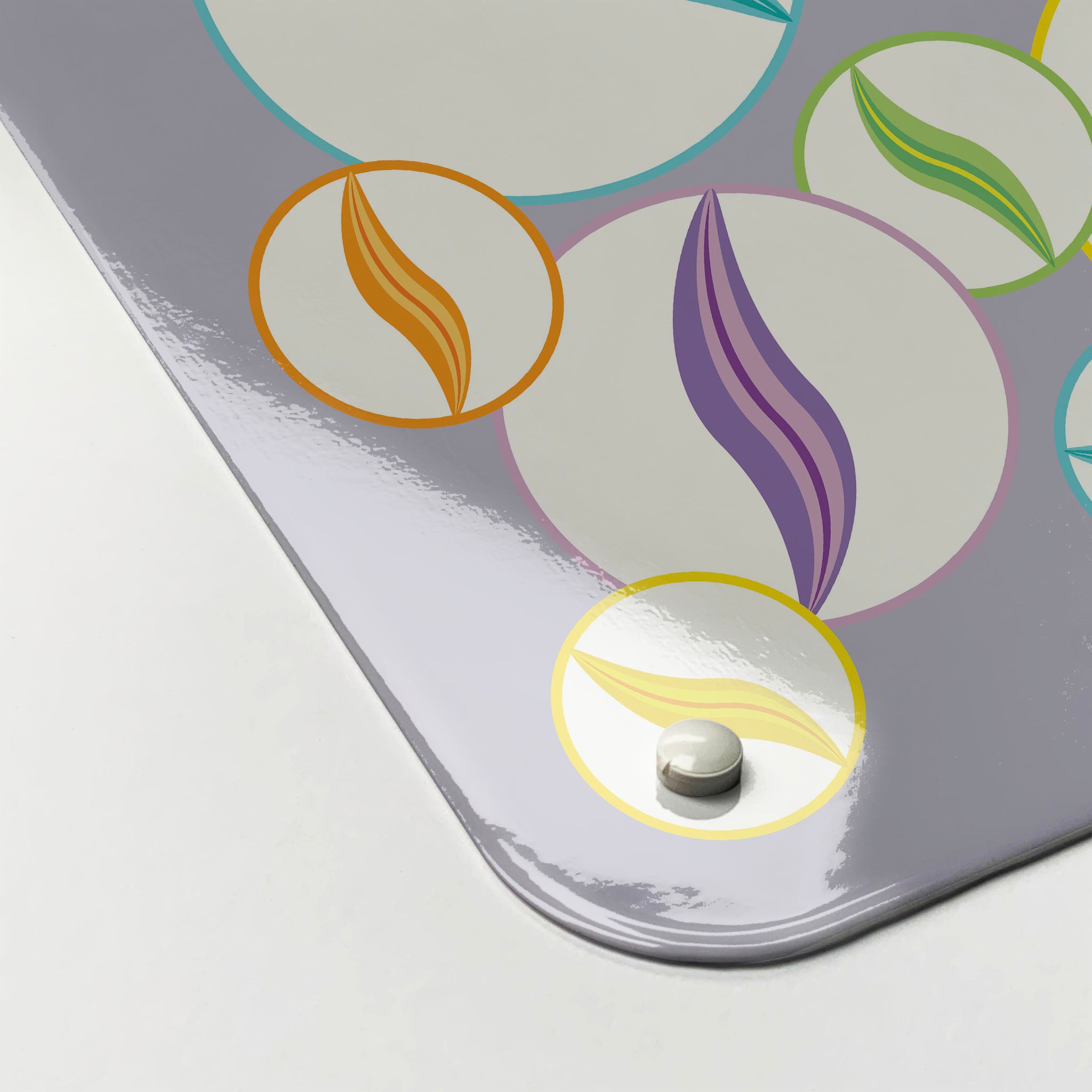 The corner detail of a marbles on mauve magnetic board to show it’s high gloss surface