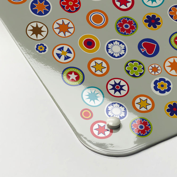The corner detail of a millefiori on grey design magnetic board to show it’s high gloss surface