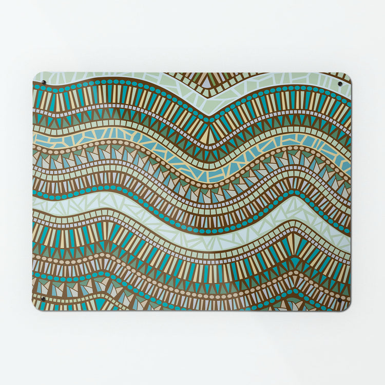 A large magnetic notice board by Beyond the Fridge with an image of a mosaic wave design in river colours