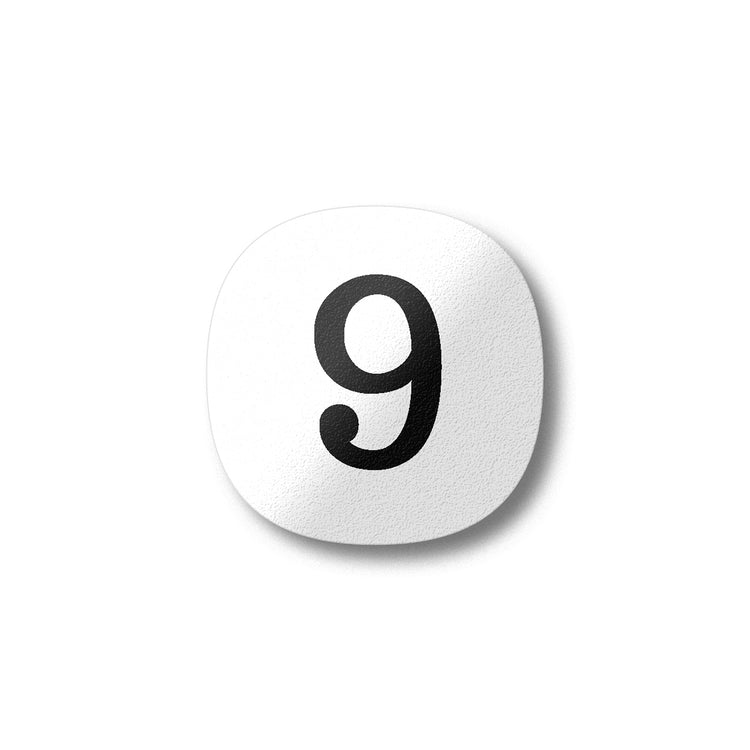 A black number nine on a white background design plywood fridge magnet by Beyond the Fridge