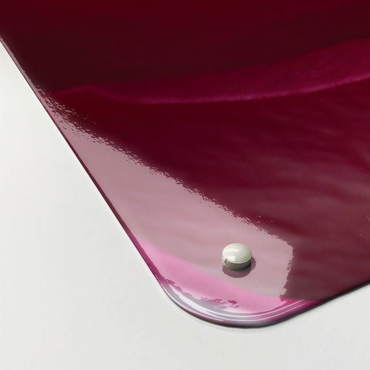 The corner detail of a  pink rose photographic magnetic board to show it’s high gloss surface