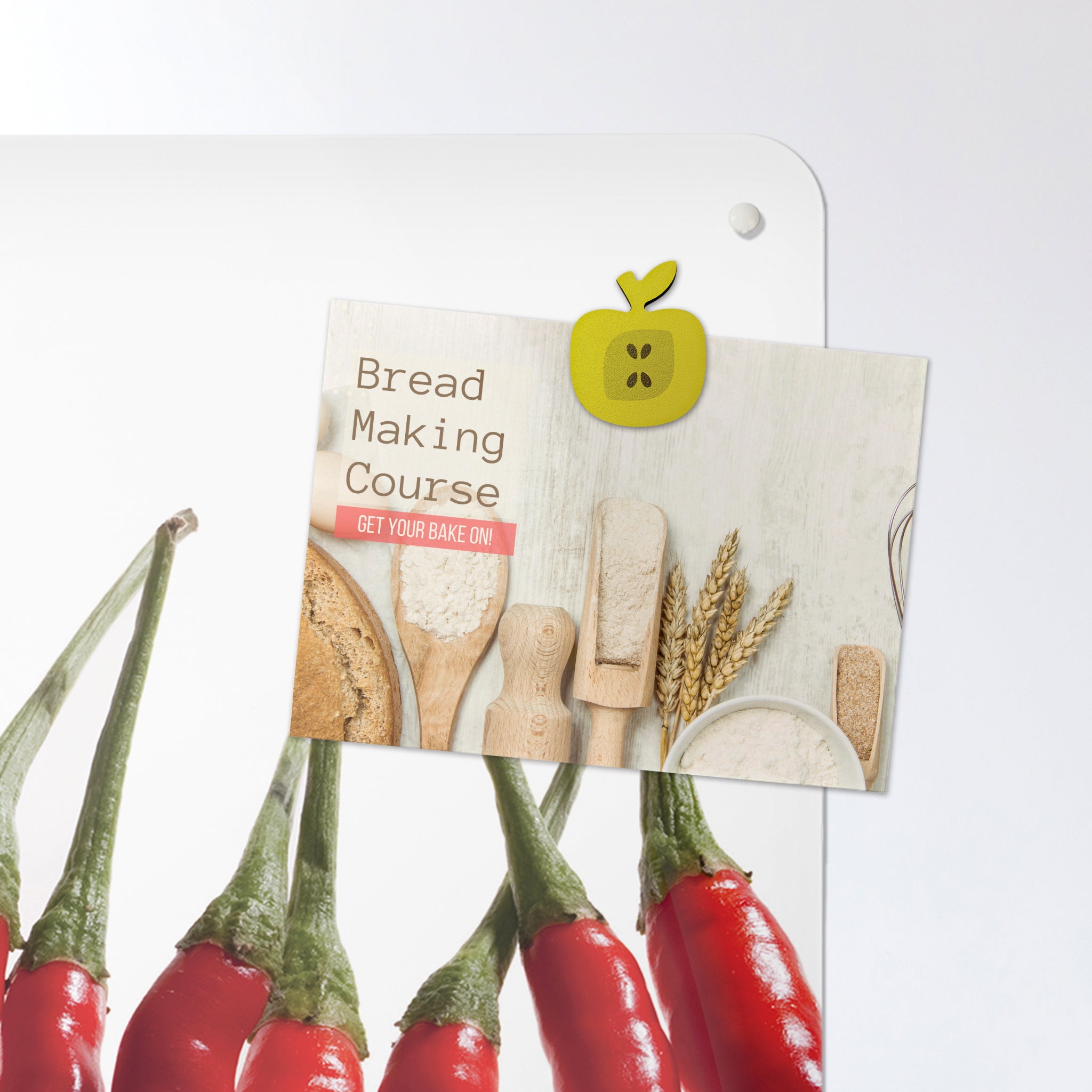 A postcard on a red chillies photographic magnetic board or metal wall art panel