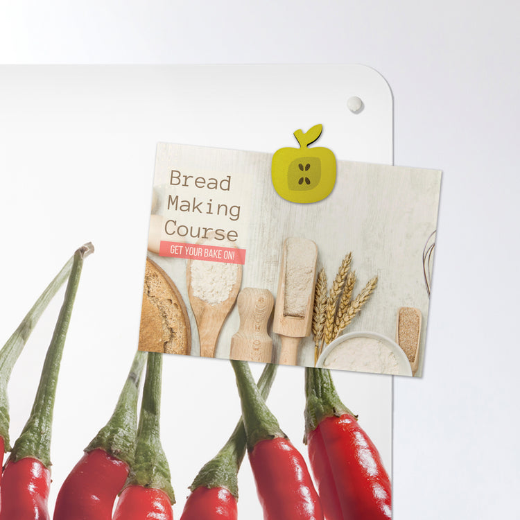 A postcard on a red chillies photographic magnetic board or metal wall art panel