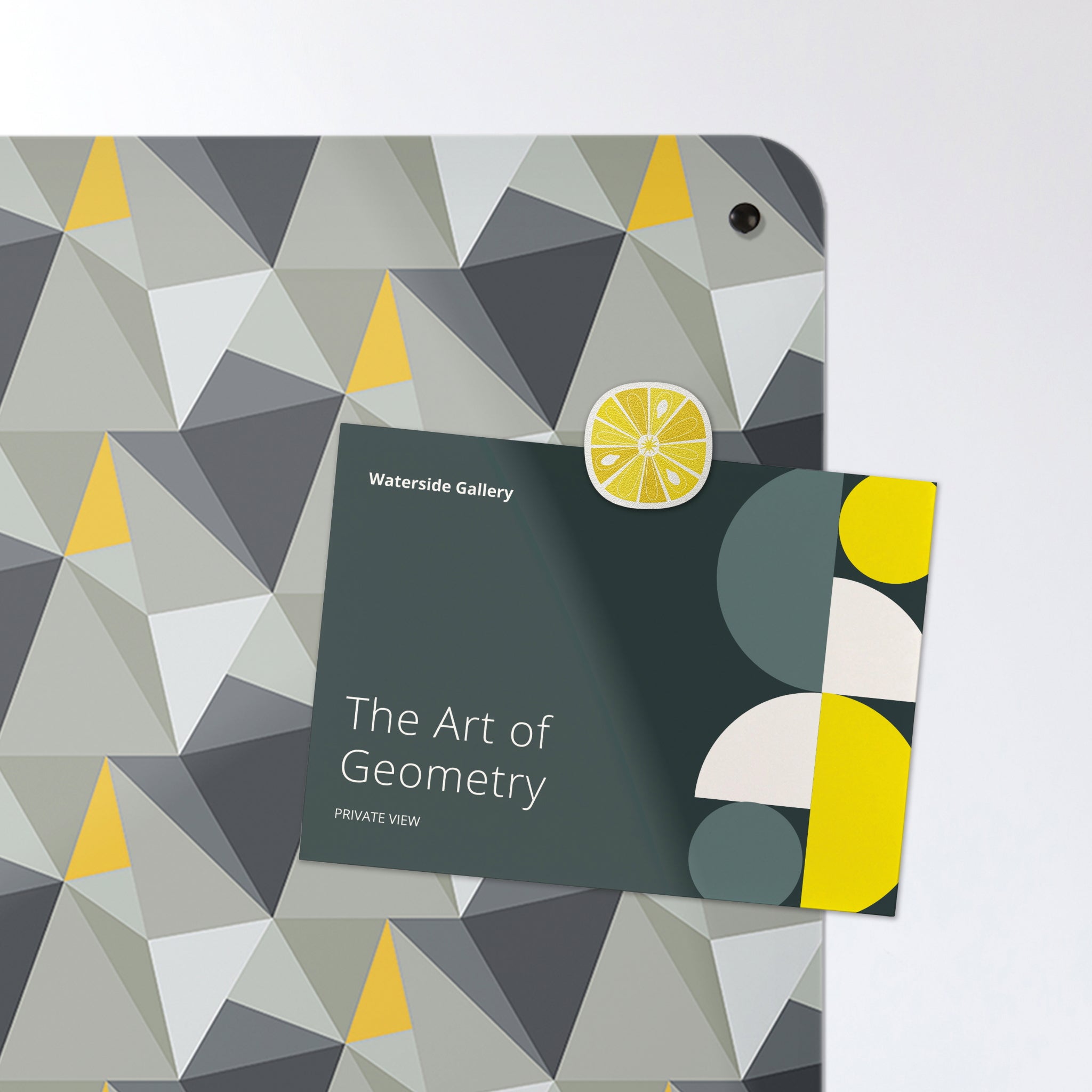 A postcard on a shards design concrete and yellow magnetic board or metal wall art panel