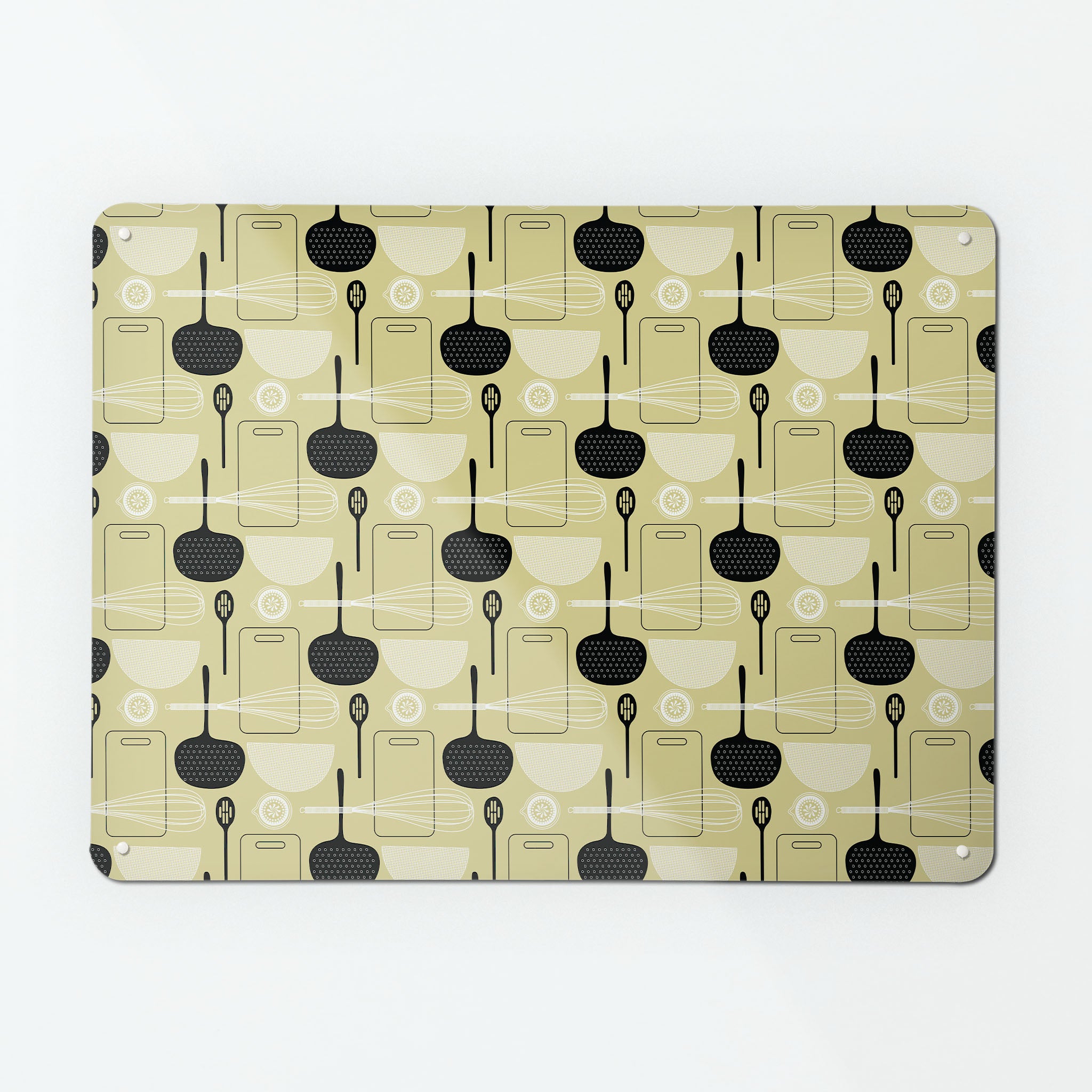 A large magnetic notice board by Beyond the Fridge with a utensils repeat pattern design in light olive colour way
