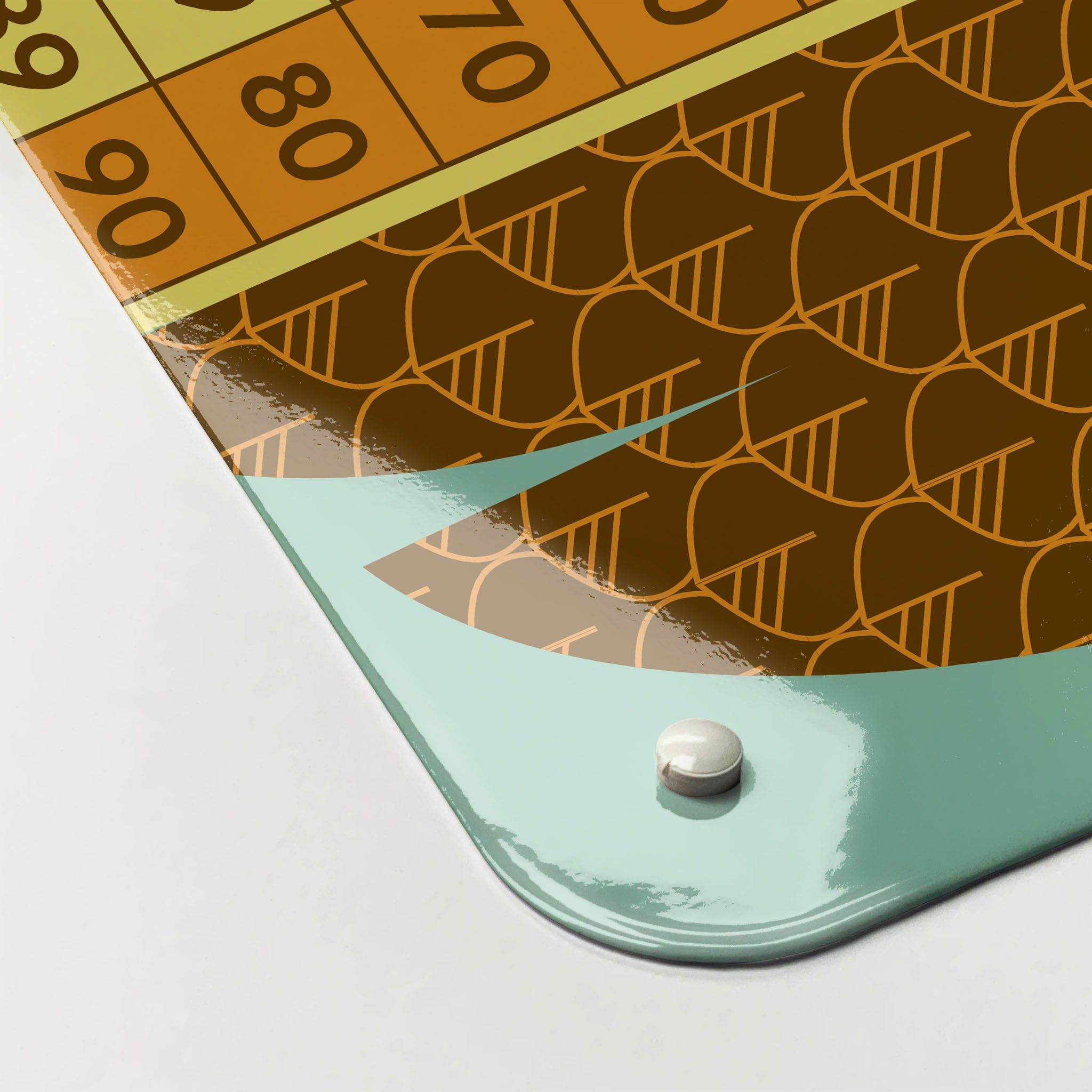 The corner detail of a wise owl number square design magnetic board to show it’s high gloss surface