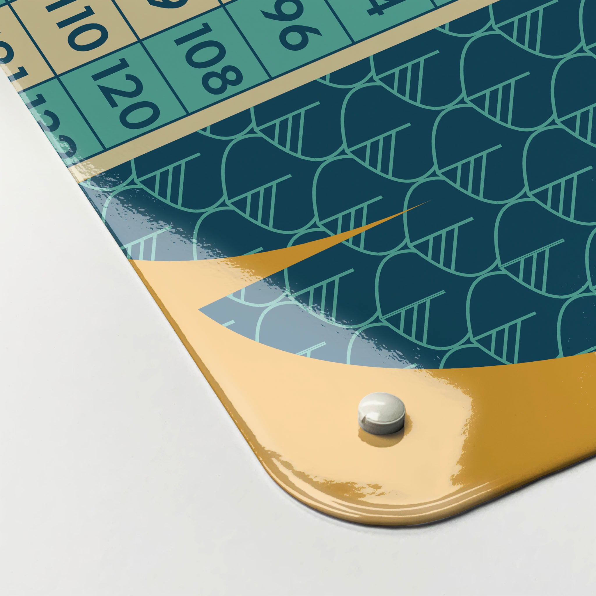 The corner detail of a wise owl times tables design magnetic board to show it’s high gloss surface