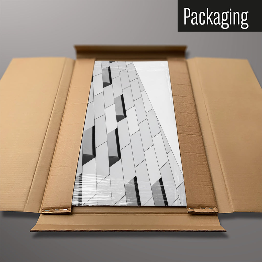 The Abstract Windows magnetic notice board packed flat in its cardboard box