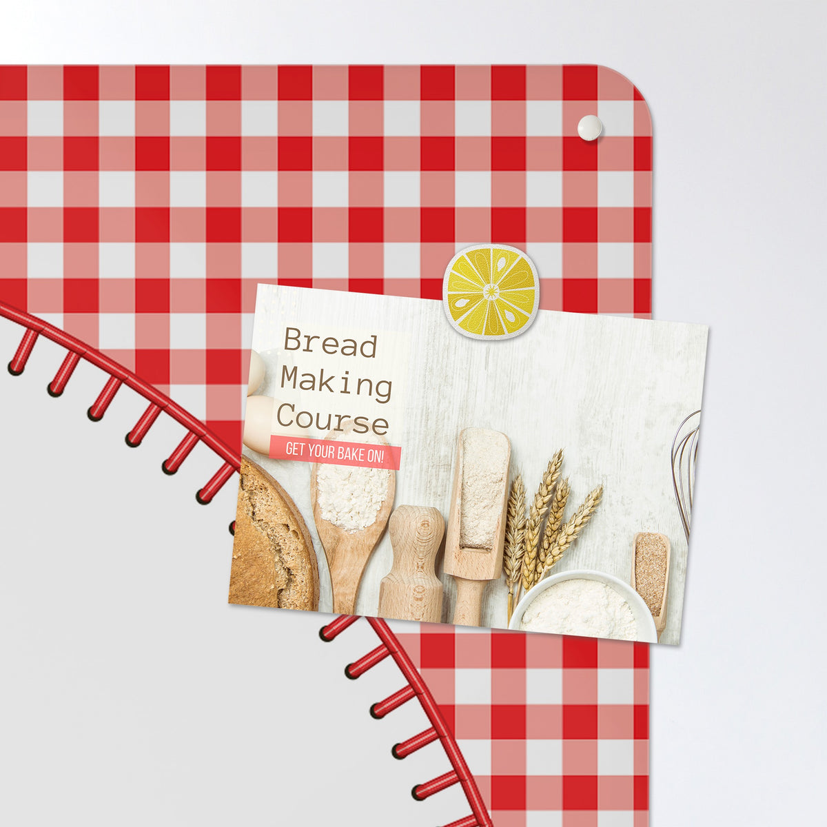A postcard held by a fridge magnet on the Applique Heart On Red Gingham magnetic notice board in Applique Heart on Red Gingham