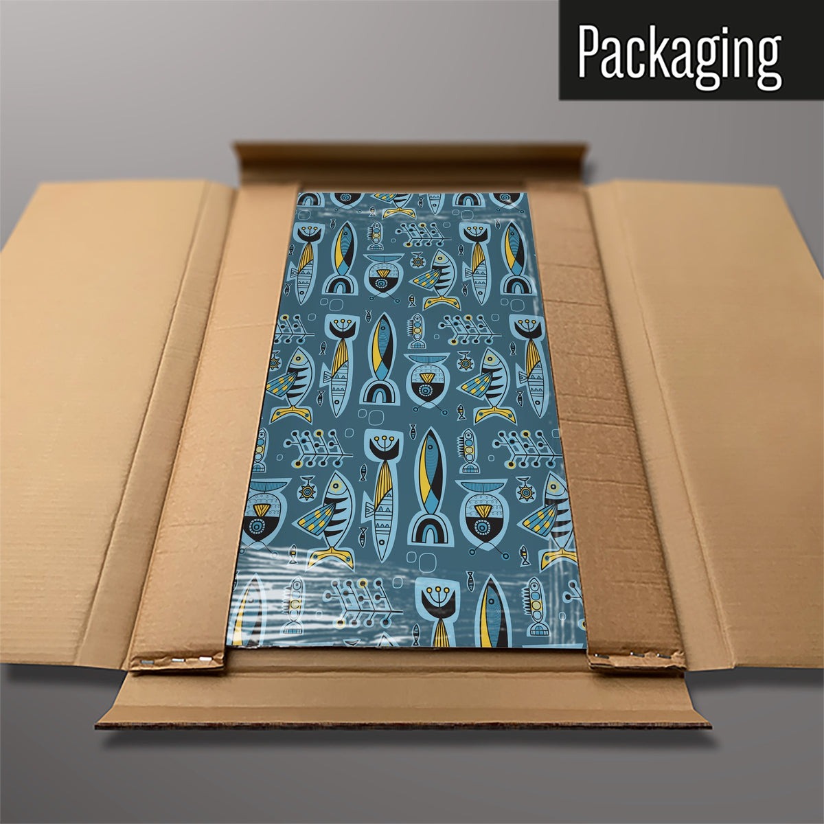 The Aquarium magnetic notice board in Deep Blue packed flat in its cardboard box