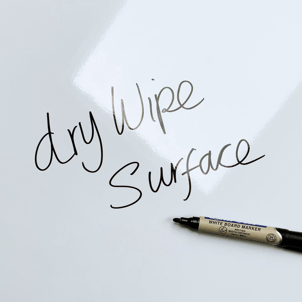 The words dry wipe surface written in marker pen on the Artic Fox magnetic notice board