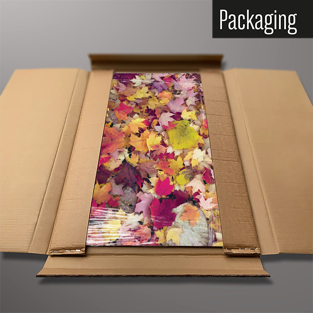 The Autumn Leaves magnetic notice board in Autumn Leaves packed flat in its cardboard box