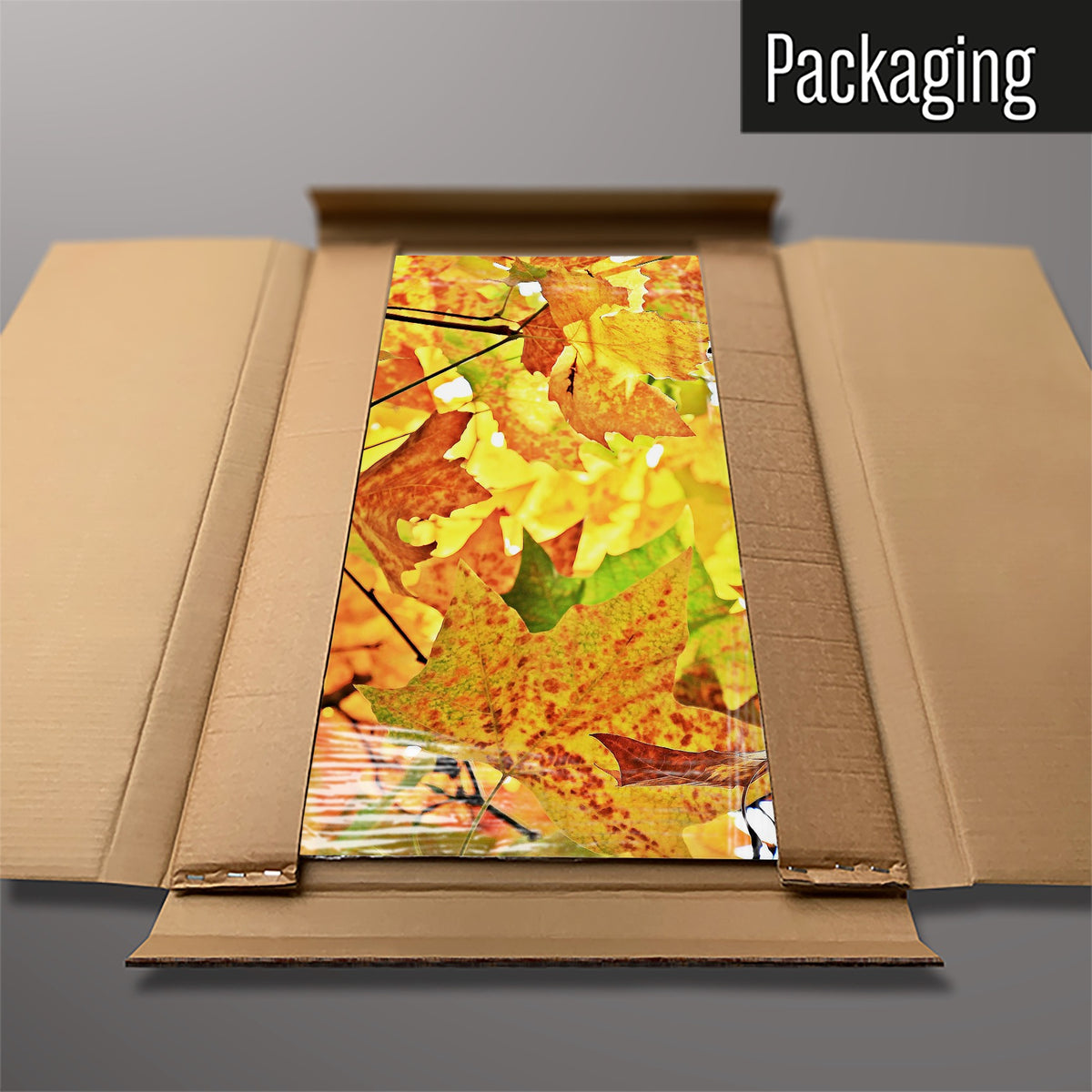 The Autumn Tree magnetic notice board packed flat in its cardboard box