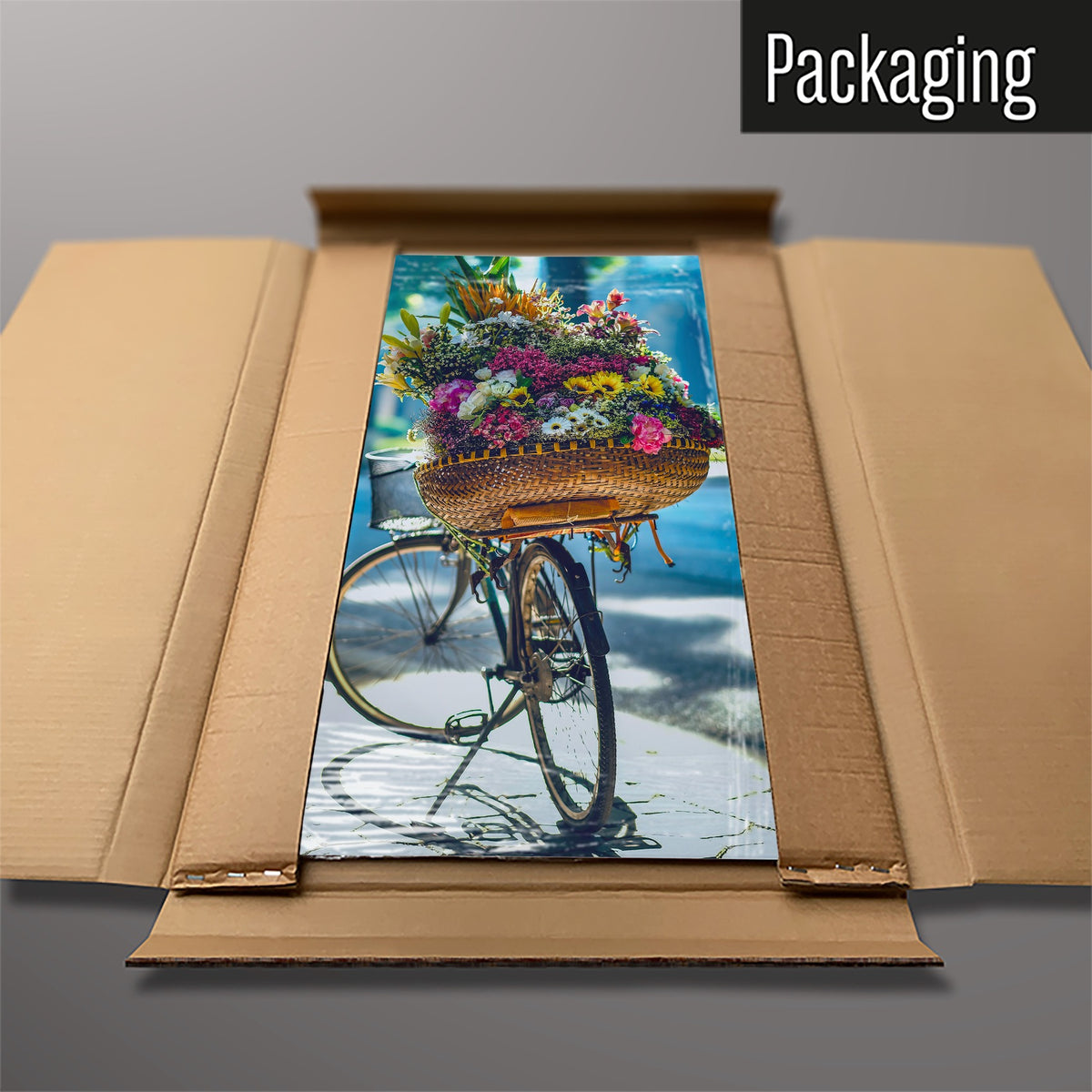 The Bicycle And Flower Basket magnetic notice board packed flat in its cardboard box