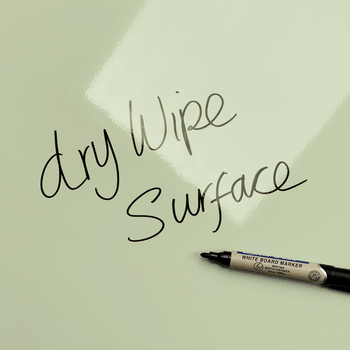 The words dry wipe surface written in marker pen on the Red Cream and Green Blocks Design magnetic notice board