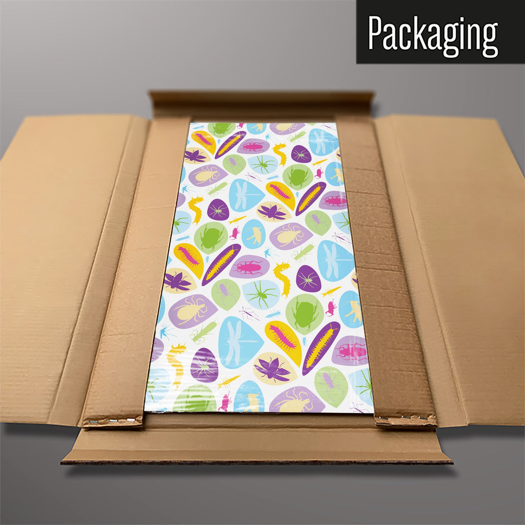 The Bugs Bright magnetic notice board packed flat in its cardboard box