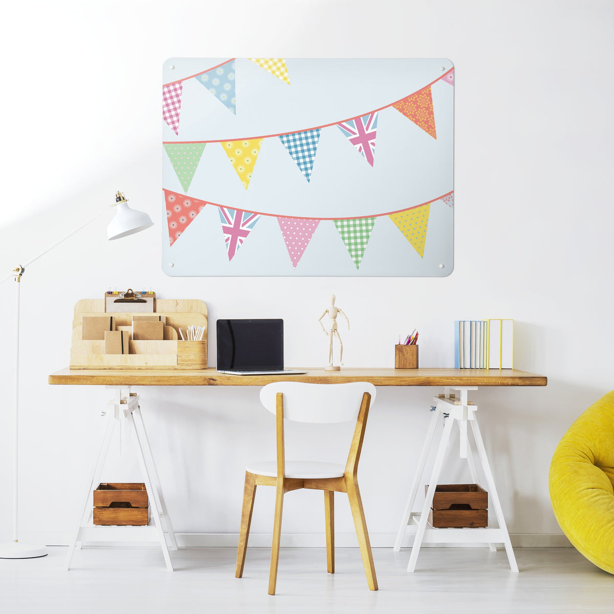 Bunting magnetic notice board above a desk in a home office