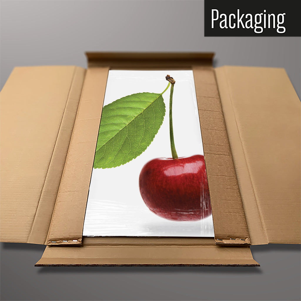 The Cherry magnetic notice board in Cherry packed flat in its cardboard box