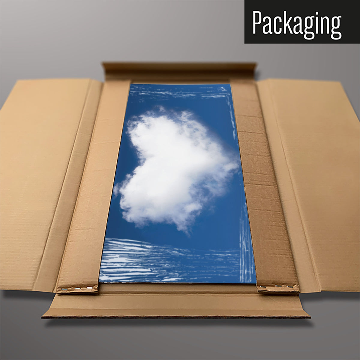 The Cloud Heart magnetic notice board in Cloud Heart packed flat in its cardboard box