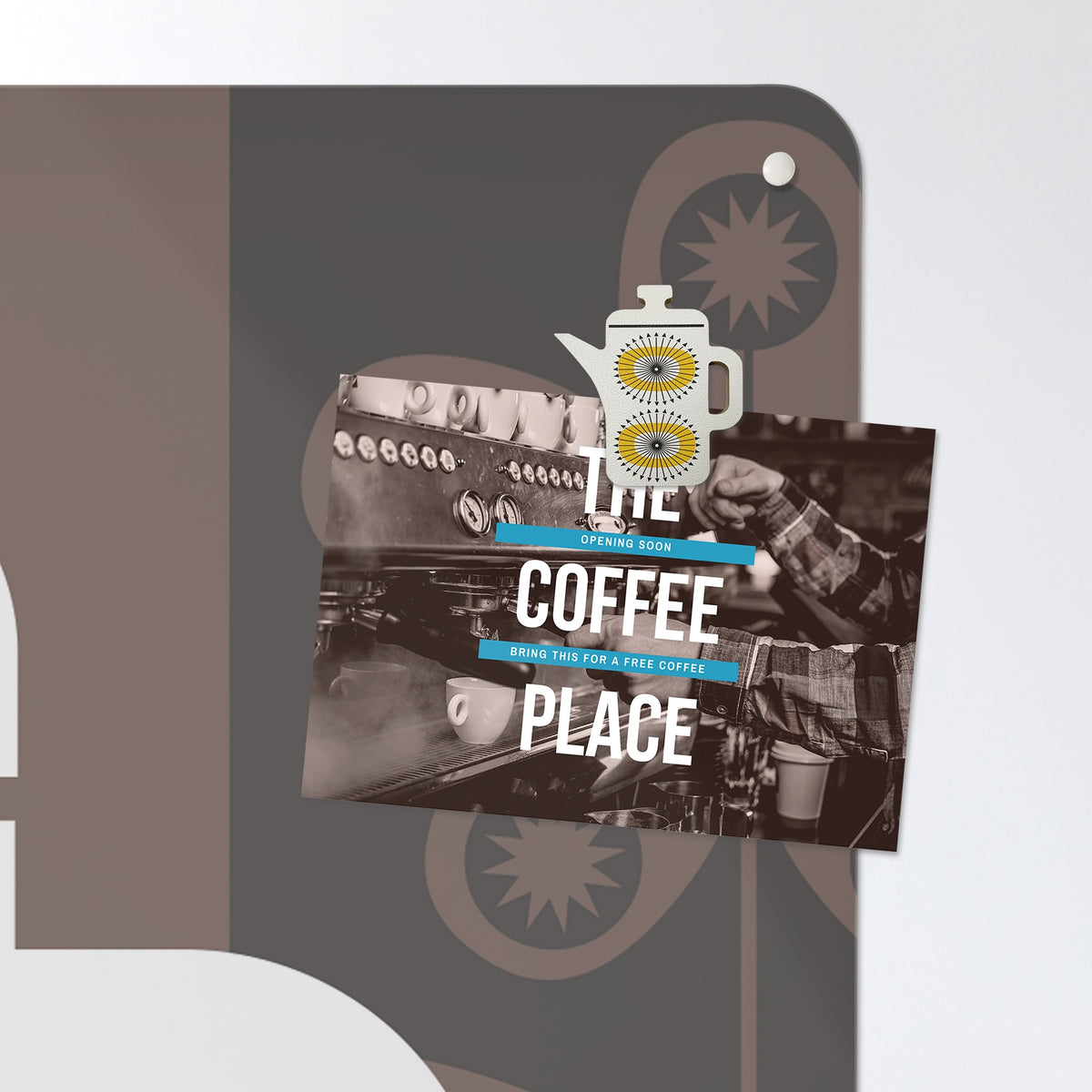 A postcard held by a fridge magnet on the Coffee Pot magnetic notice board in Coffee Pot - White