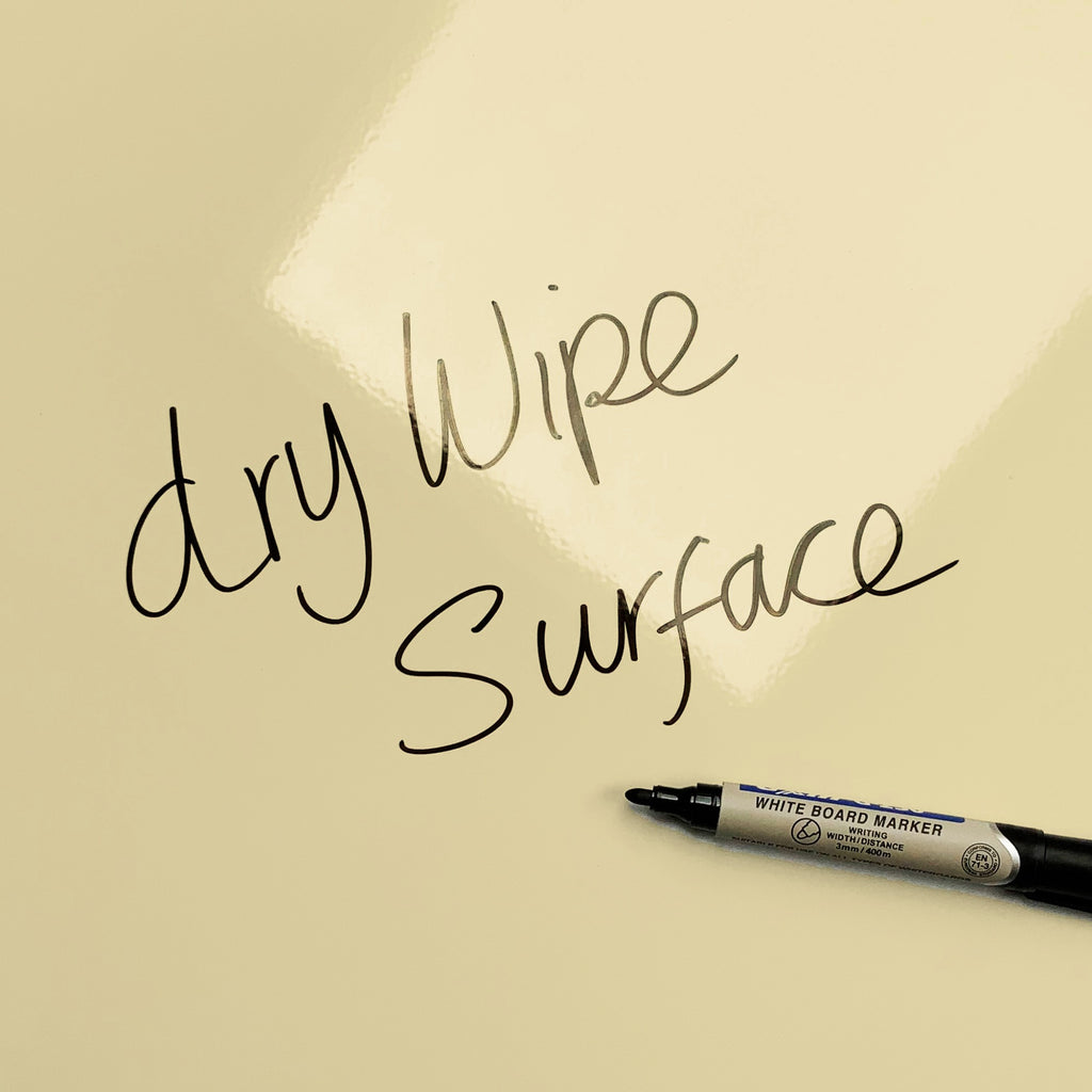 The words dry wipe surface written in marker pen on the Collecting Leaves magnetic notice board