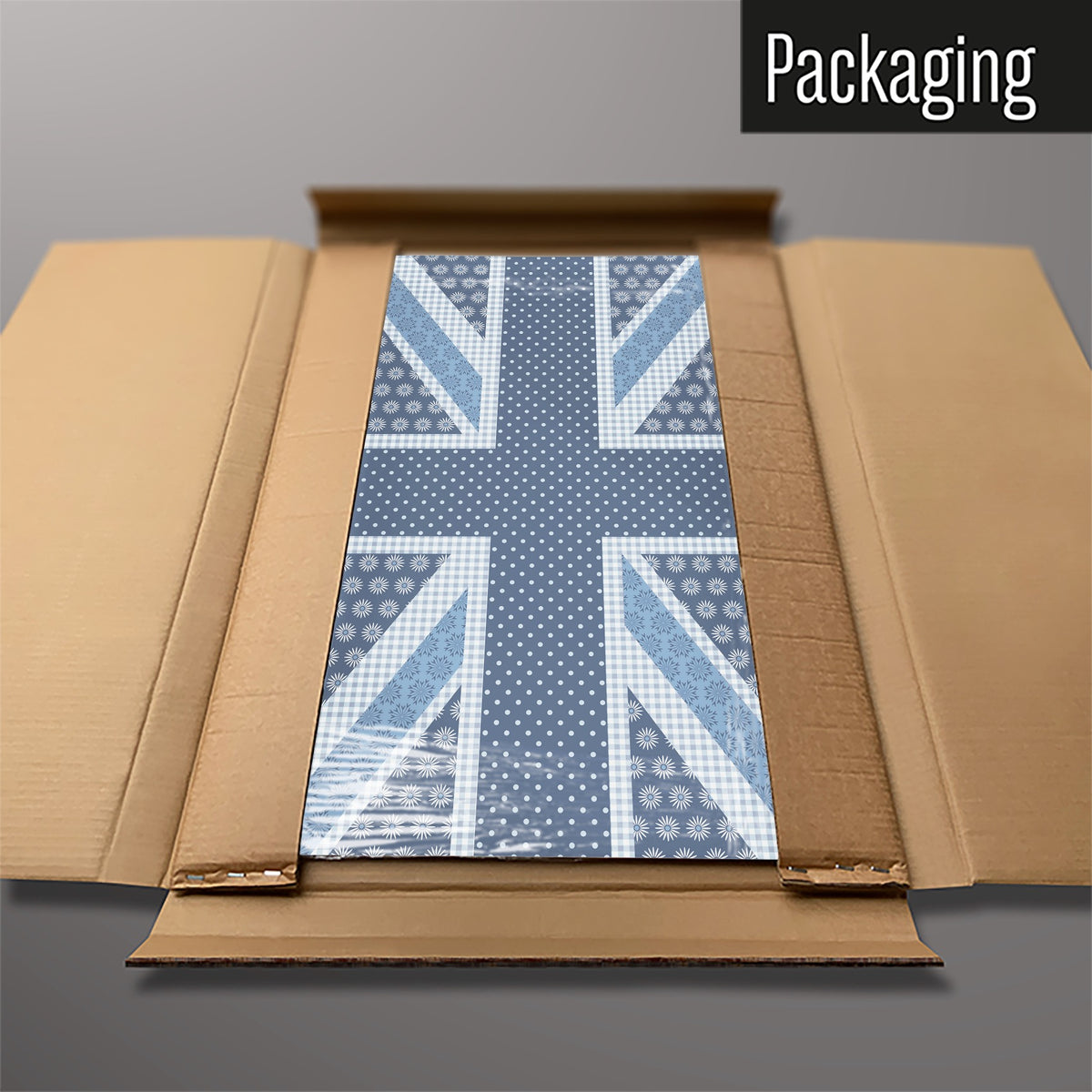 The Cool Britannia magnetic notice board in Blue packed flat in its cardboard box