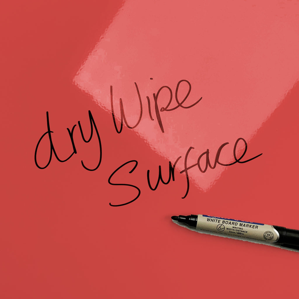 The words dry wipe surface written in marker pen on the Fruity Cool Britannia magnetic notice board