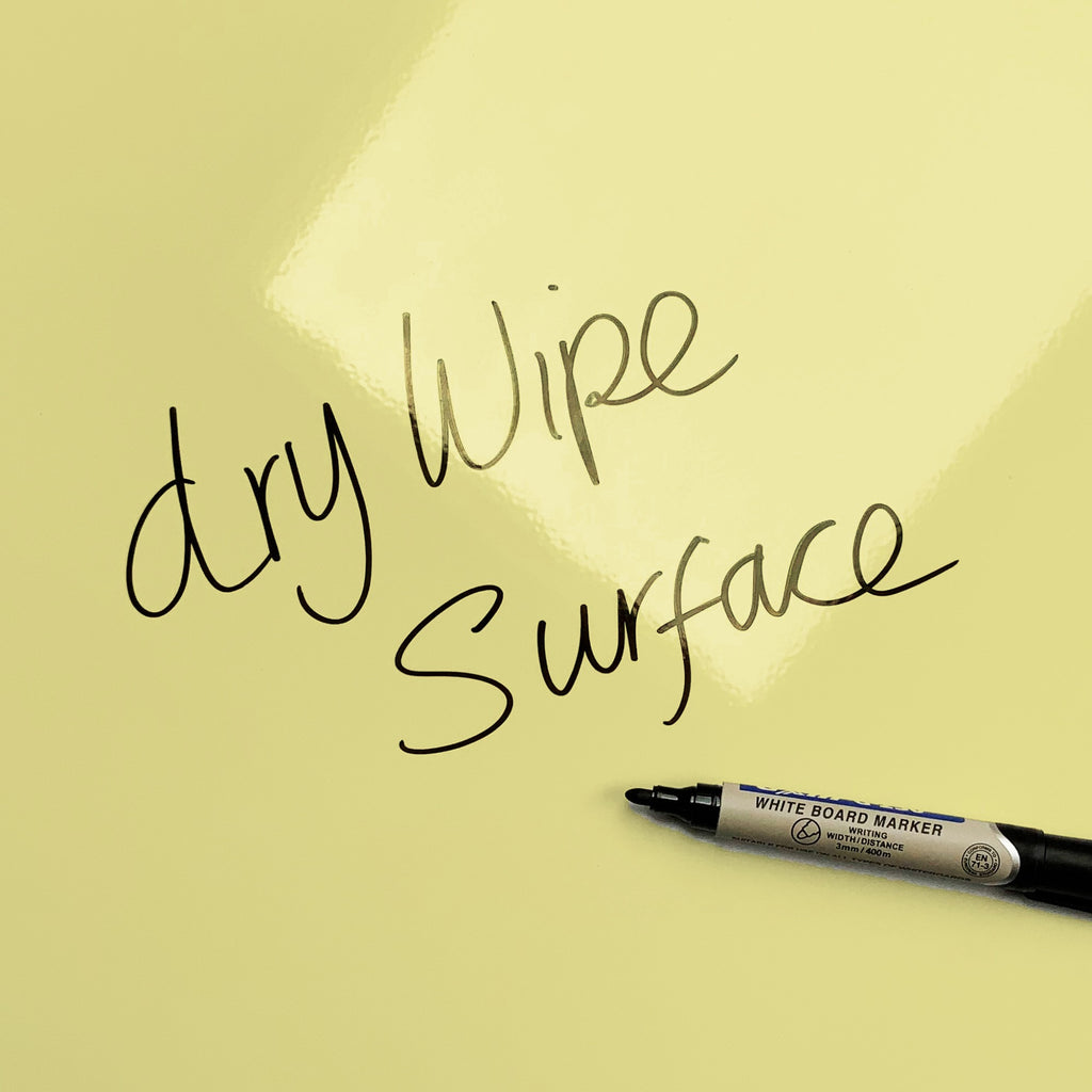 The words dry wipe surface written in marker pen on the Cupcake Plant - Yellow Cupcake Plant magnetic notice board