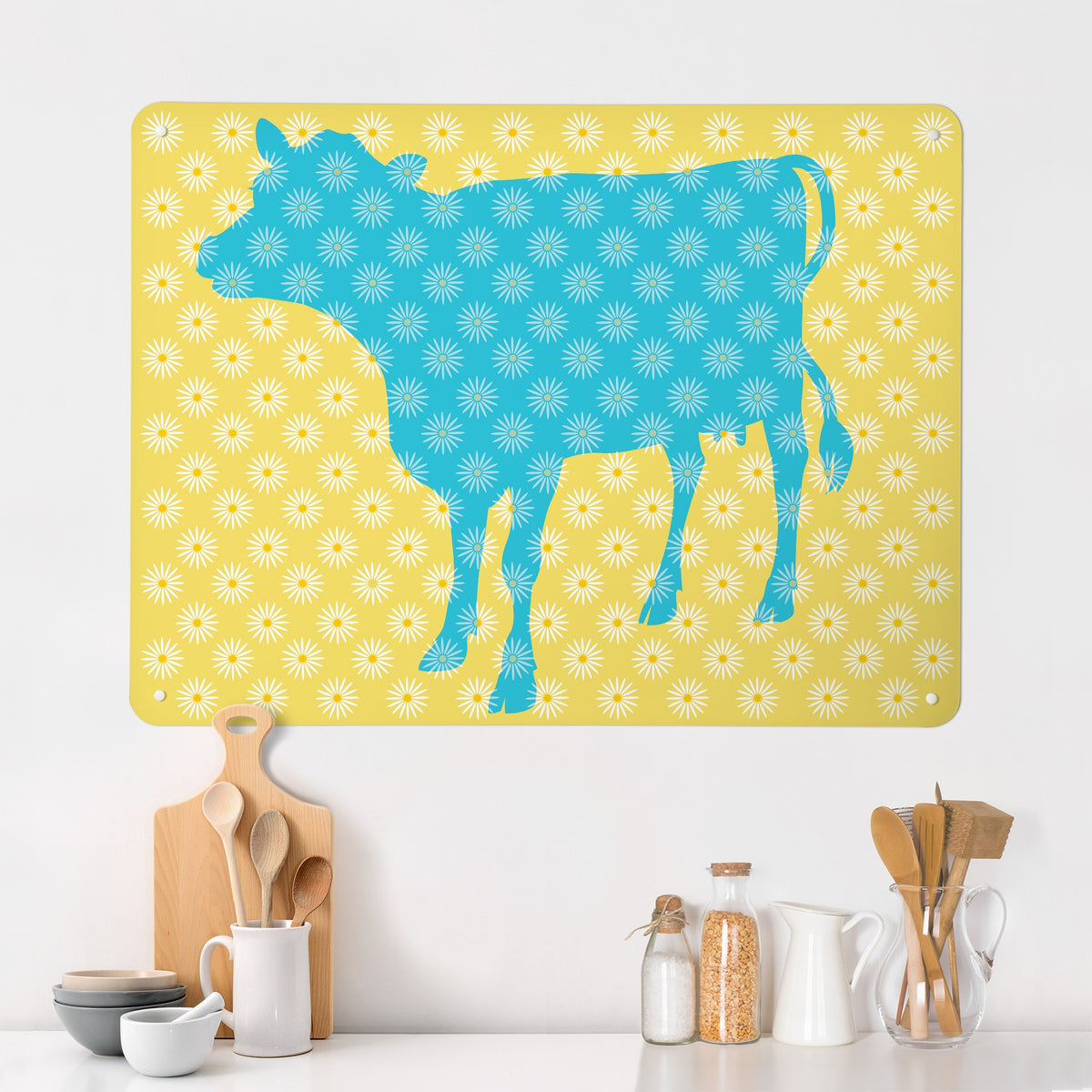 Daisy The Cow magnetic notice board in Blue/Yellow on a kitchen wall