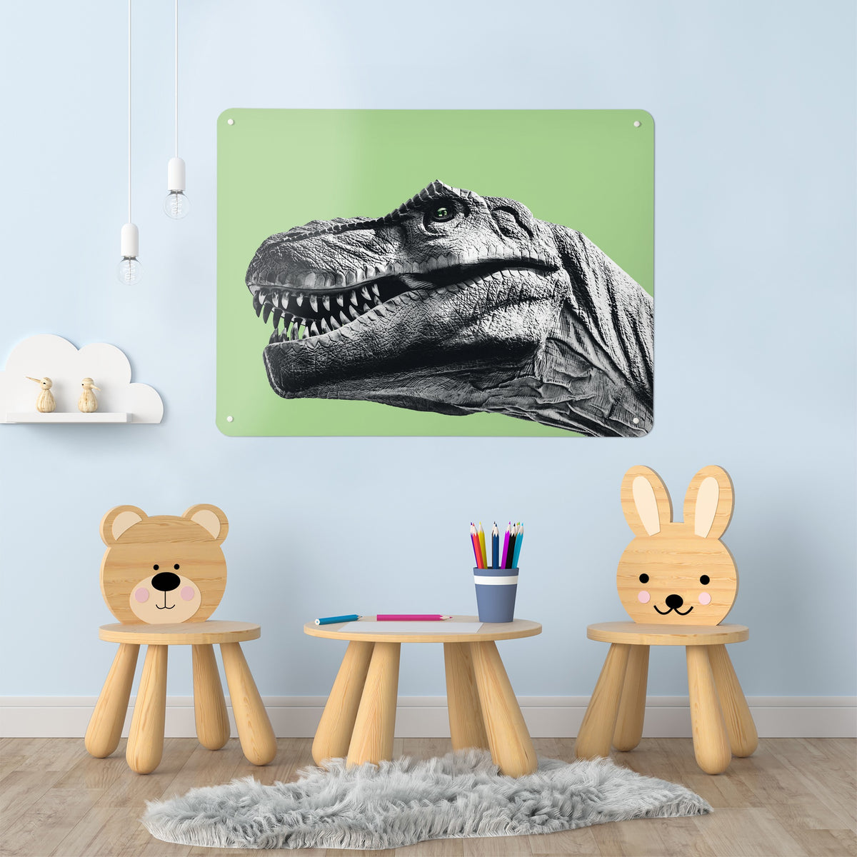 Dinosaur magnetic notice board in green on the wall of a children's room