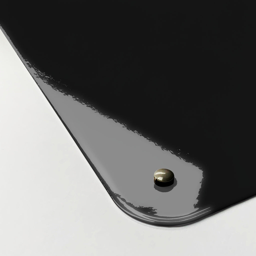 Close-up of the corner of the Earth From Space magnetic notice board, showing the gloss finish and a screw cap