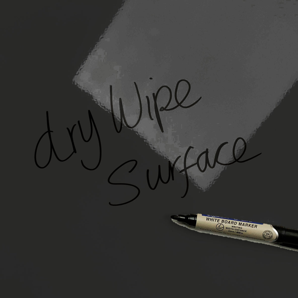 The words dry wipe surface written in marker pen on the Elephant magnetic notice board