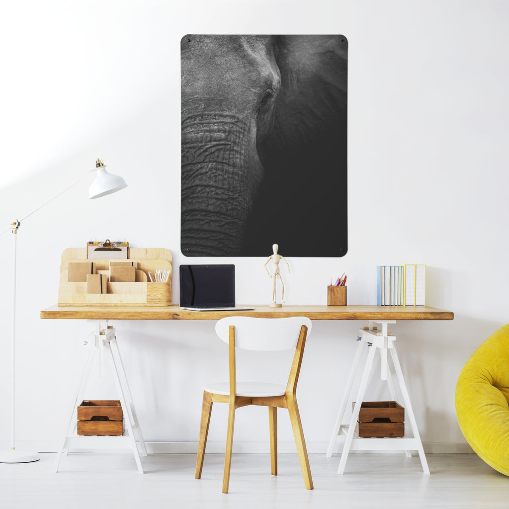 Elephant magnetic notice board above a desk in a home office
