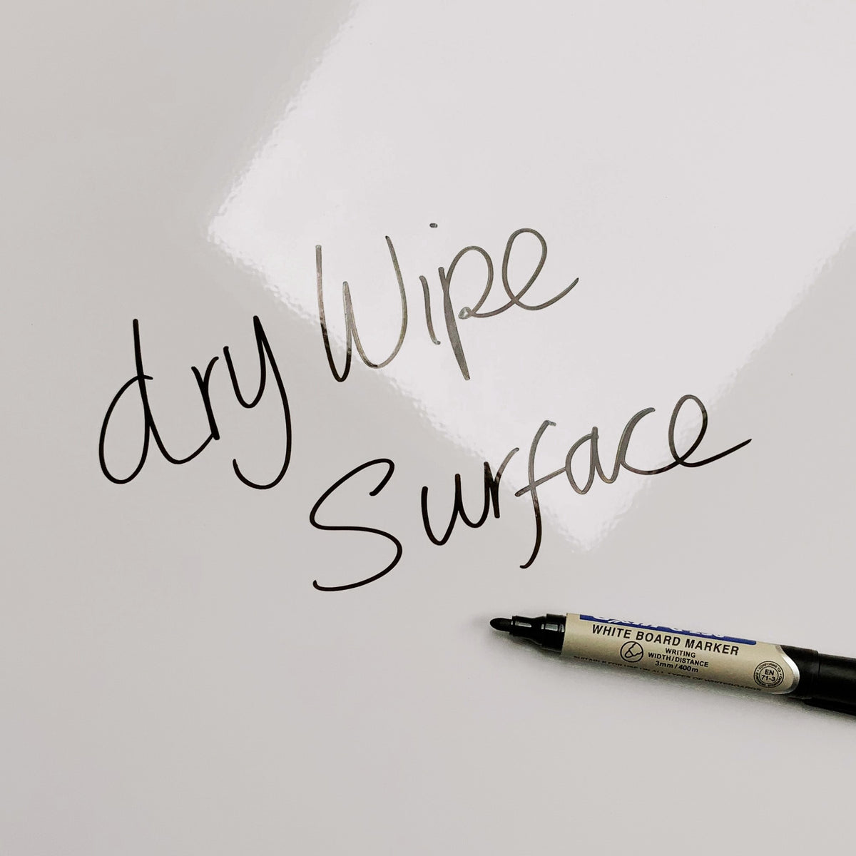 The words dry wipe surface written in marker pen on the Epcot Center magnetic notice board
